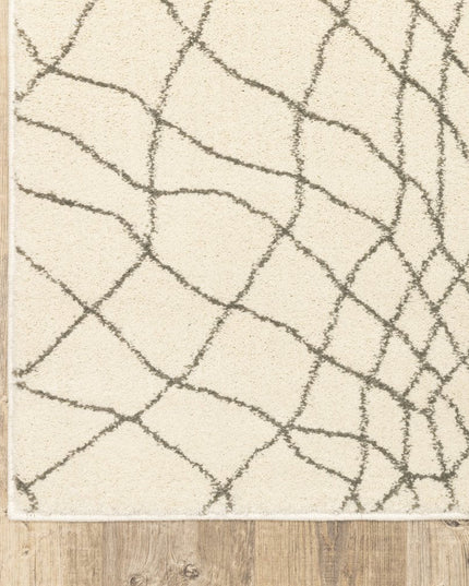 10' X 13' Ivory And Grey Geometric Power Loom Stain Resistant Area Rug