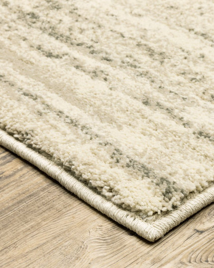 10' X 13' Beige And Grey Abstract Power Loom Stain Resistant Area Rug