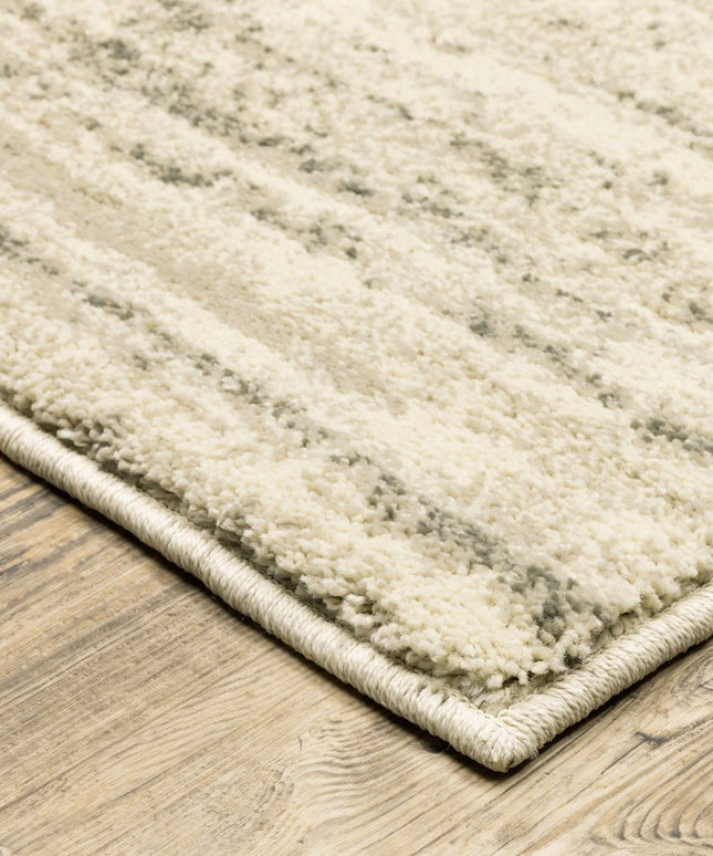 10' X 13' Beige And Grey Abstract Power Loom Stain Resistant Area Rug