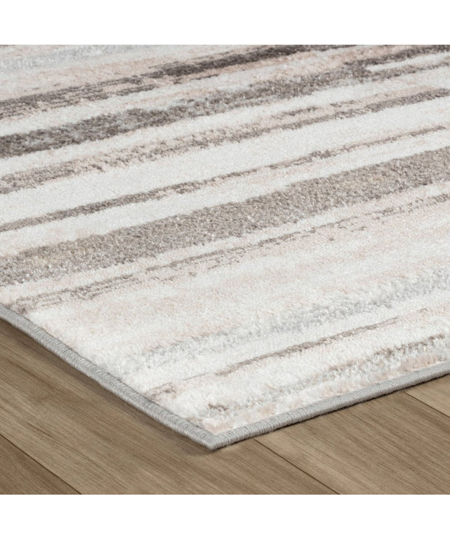 5' X 8' Beige and Brown Abstract Distressed Area Rug